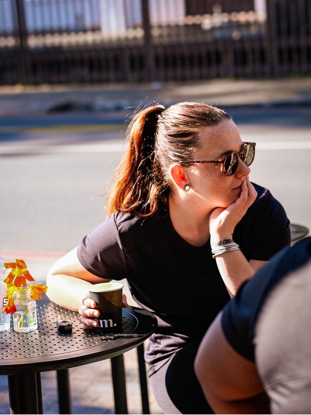A runner enjoying coffee after the run